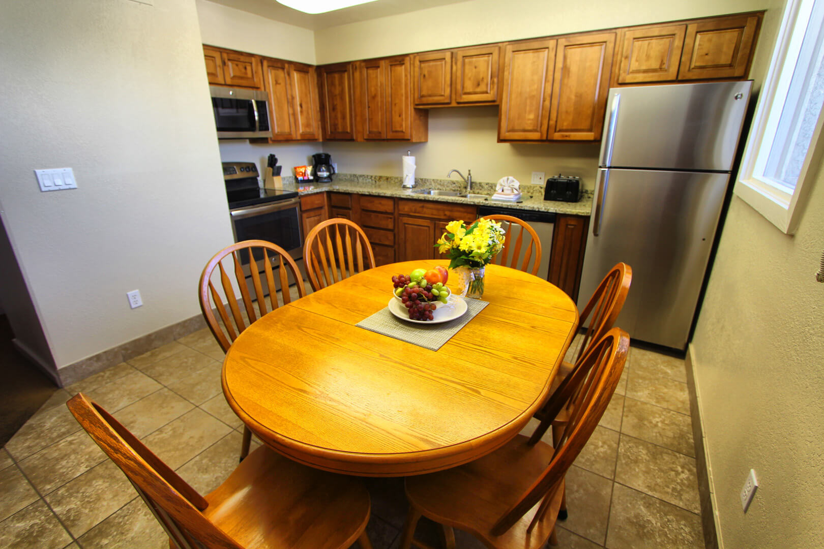 A fully equipped kitchen at VRI's Villas at South Gate in St George, Utah.